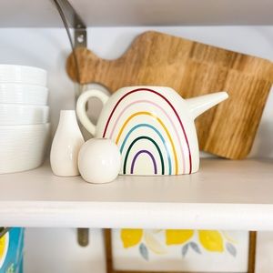 Ceramic rainbow watering can.